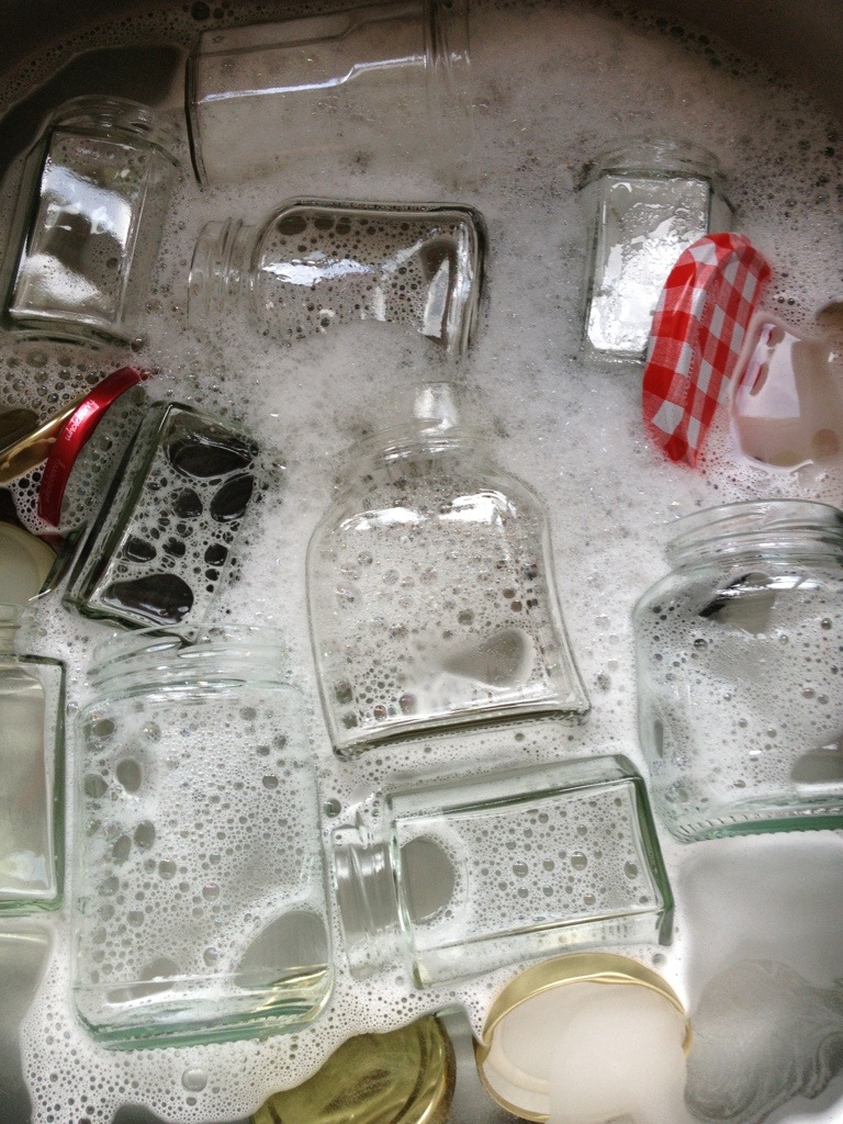 Wash jars and lids in hot soapy water