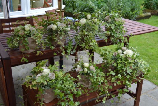 Ivy and rose table centres